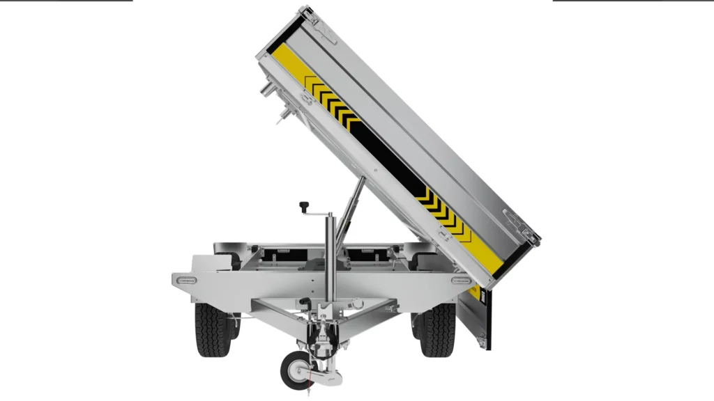 The PW27-3018 (KIPER) dump trailer with black and yellow side stripes is shown with a raised load bed, dual wheels and a front support wheel, ready for loading or unloading.